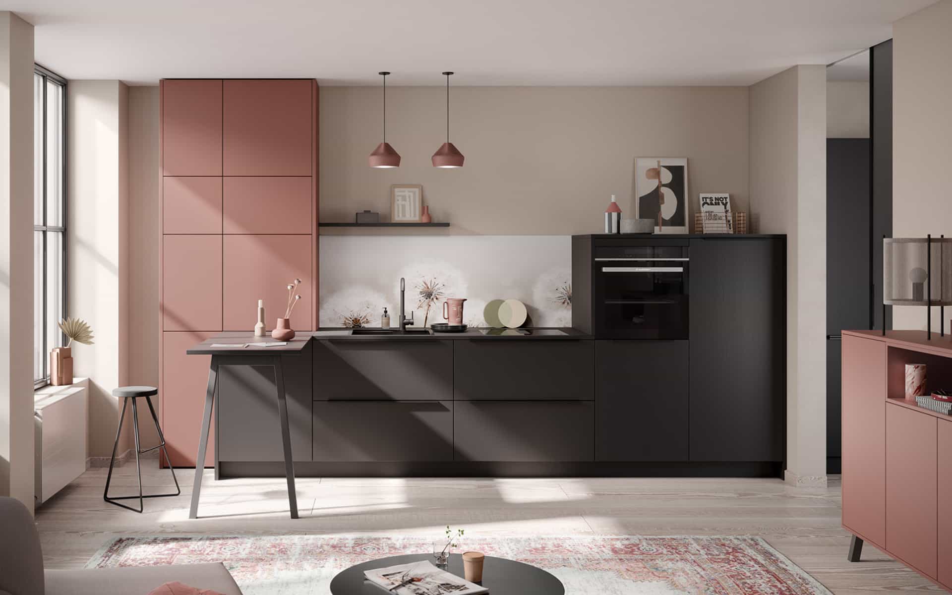 Cuisine moderne rose poudré et noir mat avec façades sans poignées, four encastré et espace repas intégré